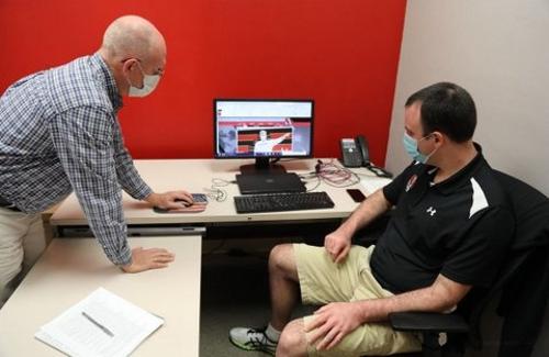 ASD Trevor Wenners and SD John Hughes check out the new website.