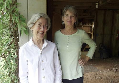 merri lawrence and ann beason outside their photogram darkroom